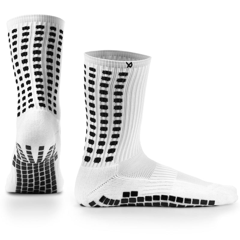 White LUX grip socks for football with anti-slip soles and arch compression.
