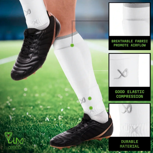 White LUX football sleeves with advanced compression and silicone grip for secure fit, enhancing performance on the field.