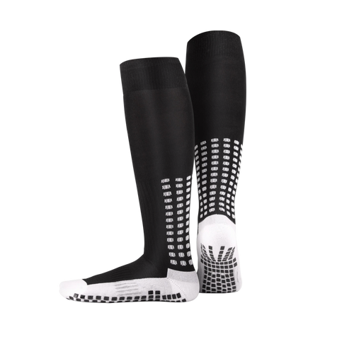 Black knee-length LUX football grip socks with anti-slip DualGrip sole