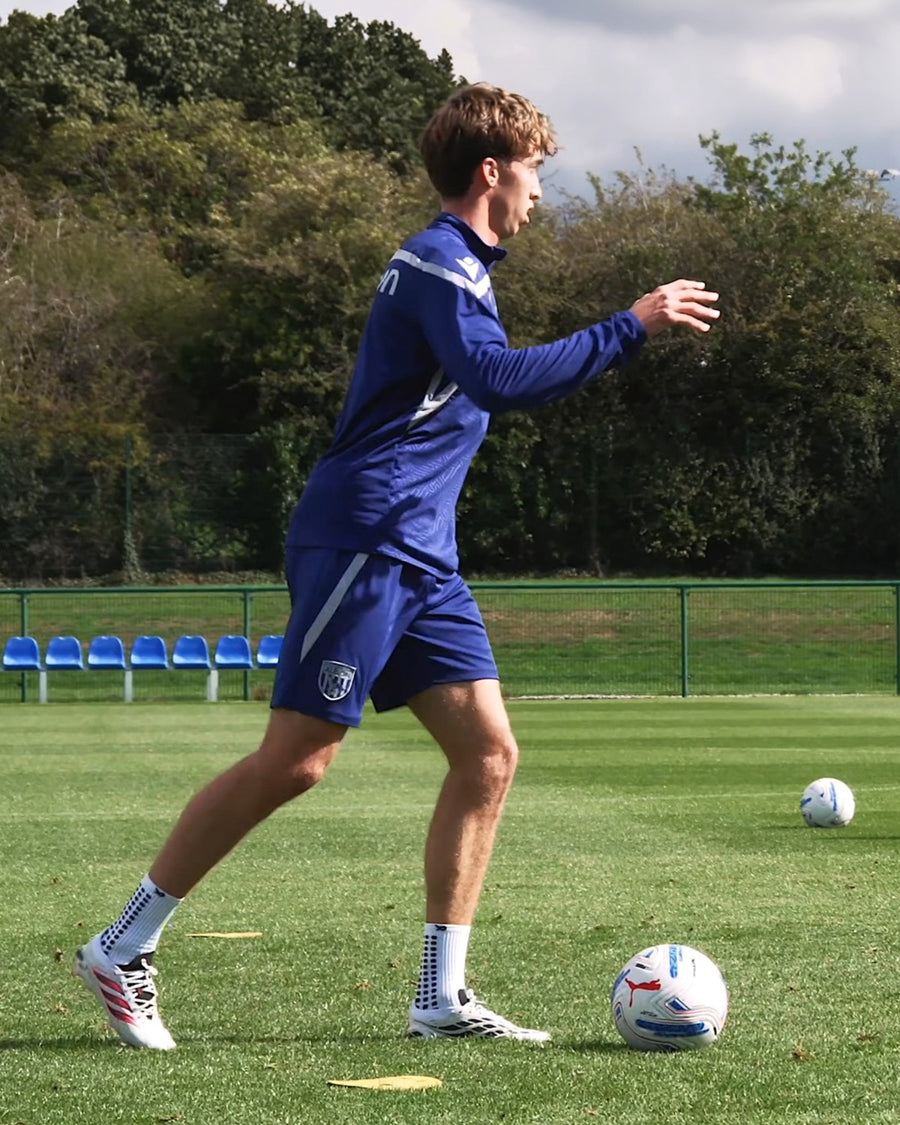 Harry Whitwell wearing LUX grip socks