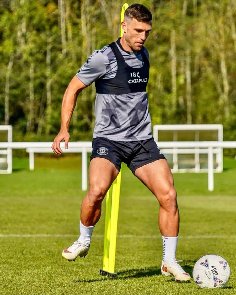 Jack Muldoon wearing LUX grip socks