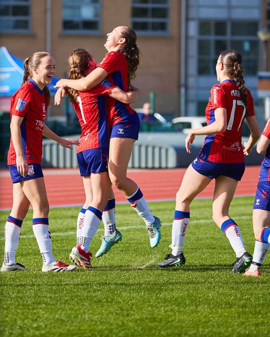 Rosie Bell & team wearing LUX grip socks