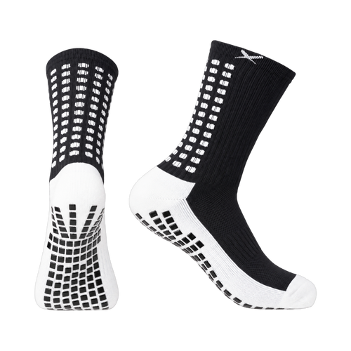 LUX V1 junior football grip socks in black, pair shown front and side