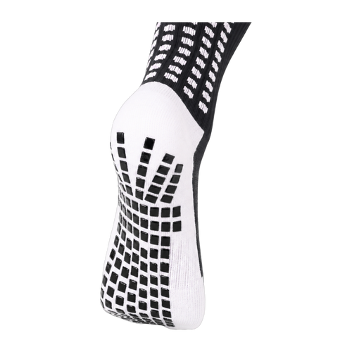 Dual Grip sole detail on the black LUX V1 junior grip sock