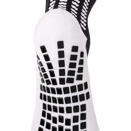 Back and heel grip detail on the black LUX V1 grip sock