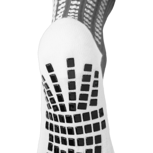 Back and heel grip detail on the gray LUX V1 grip sock