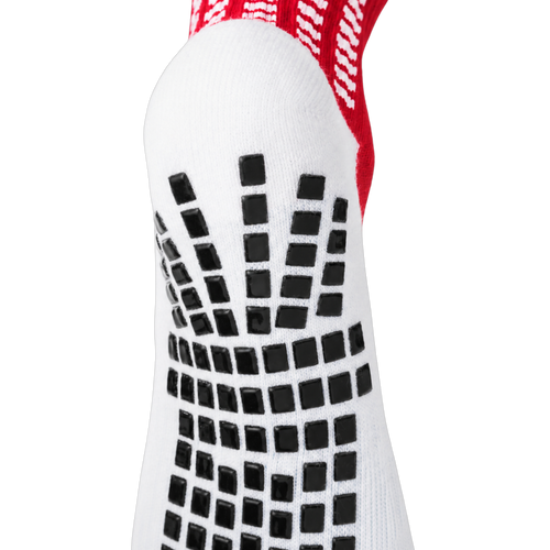 Back and heel grip detail on the red LUX V1 grip sock
