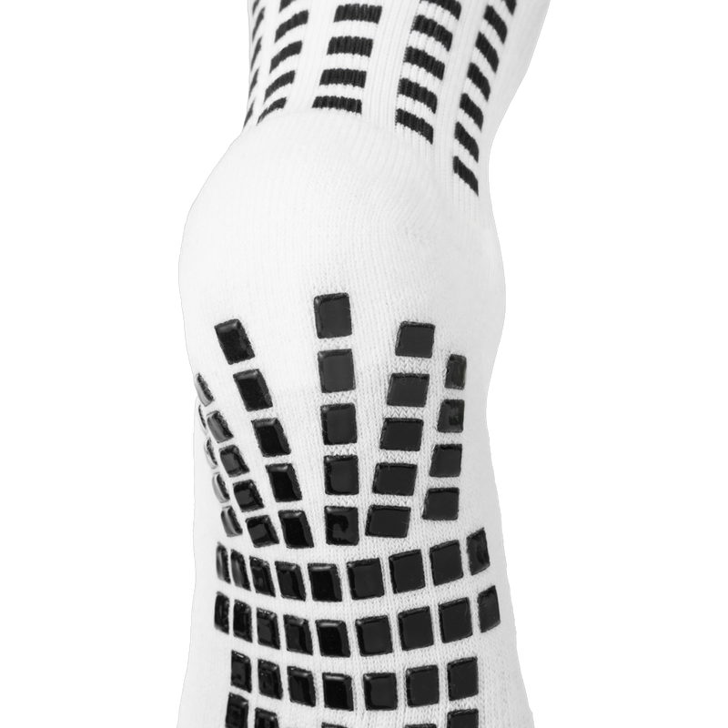 Back and heel grip detail on the white LUX V1 grip sock