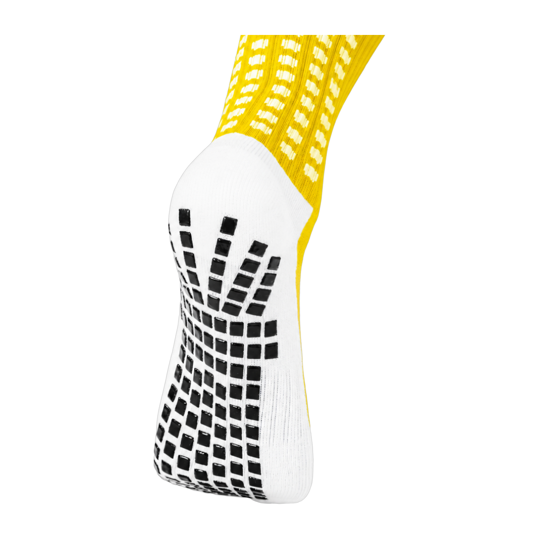 Dual Grip sole detail on the yellow LUX V1 grip sock